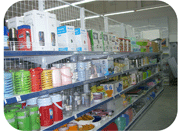 Convenience store shelving with wire mesh back panels